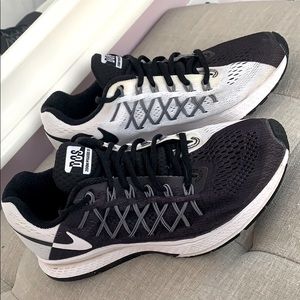 Black and white Nike running shoes